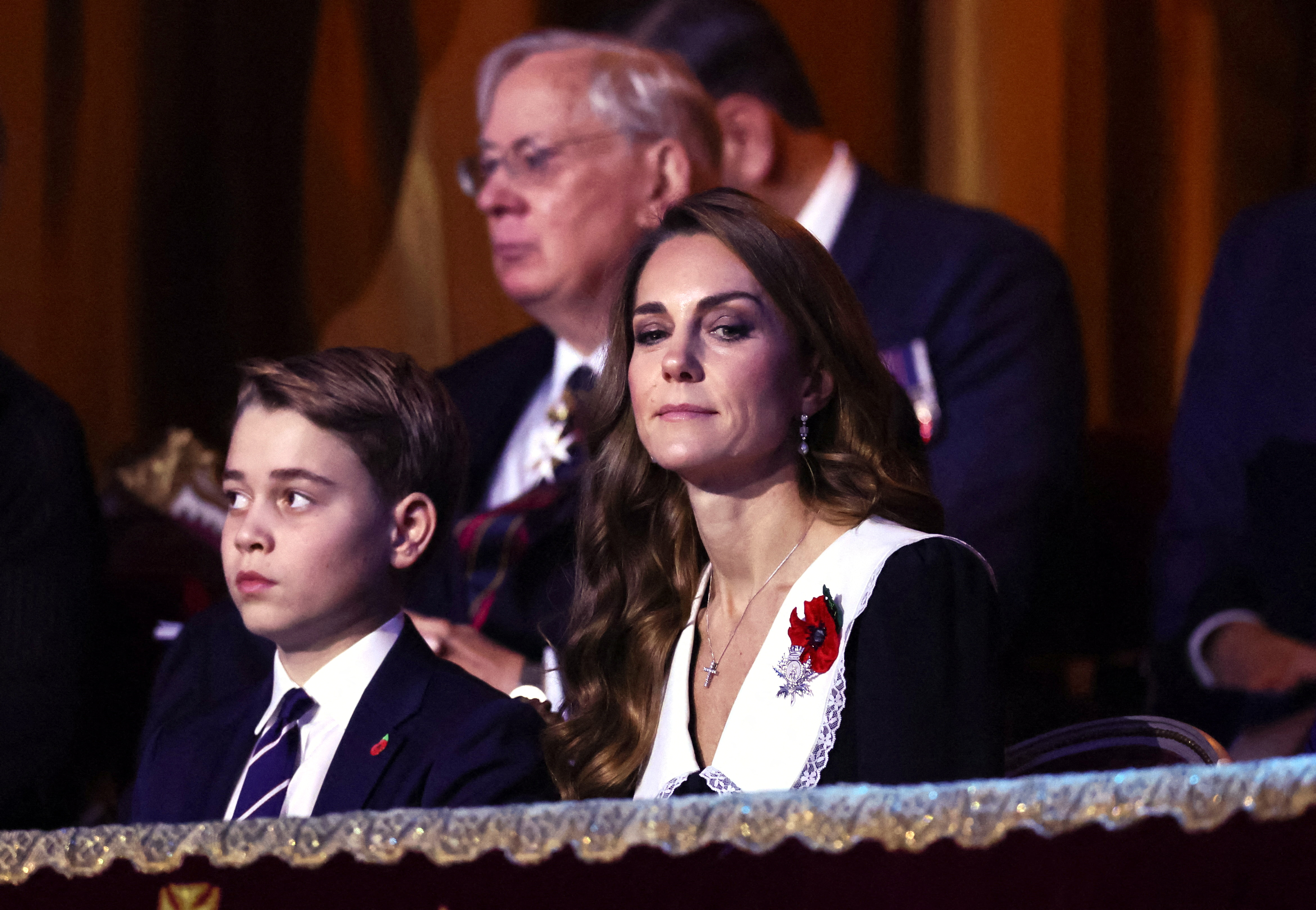 Prince George and Catherine, Princess of Wales, attend The Royal British Legion Festival of Remembrance event.