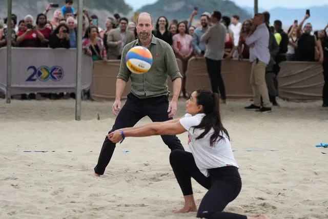 William enjoys game of volleyball as he begins five-day visit to Brazil