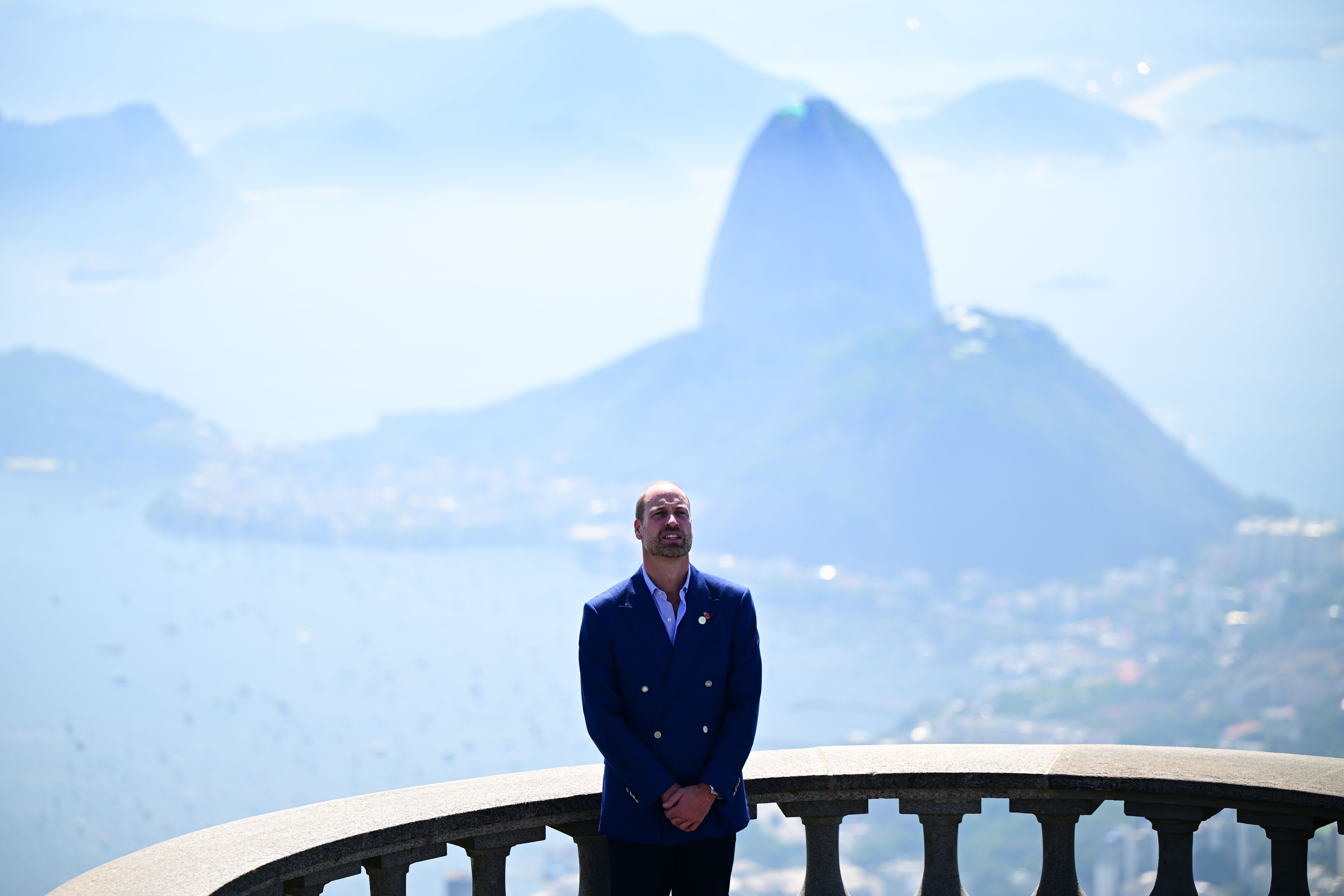 Prince William looking up at the Christ the Redeemer statue
