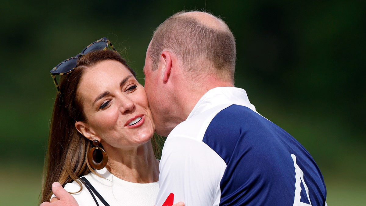 Prince William, Kate Middleton kiss in rare public display of affection at polo match with dog in tow | Fox News