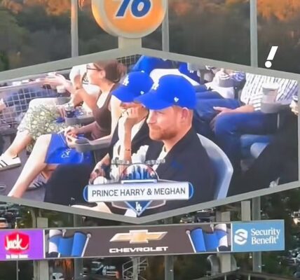 “THE NIGHT WAS MEANT TO SPARKLE — INSTEAD, IT BLEW UP IN THEIR FACES.” What should have been a glamorous World Series “date night” for Prince Harry and Meghan Markle unraveled in real time when the Sussexes appeared on the Dodgers’ Kiss Cam — and the reaction was brutal. Instead of cheers, a deafening wave of boos thundered through the stadium, leaving 56,000 fans audibly united in rejection “THE NIGHT WAS MEANT TO SPARKLE — INSTEAD, IT BLEW UP IN THEIR FACES.” What should have been a glamorous World Series “date night” for Prince Harry and Meghan Markle unraveled in real time when the Sussexes appeared on the Dodgers’ Kiss Cam — and the reaction was brutal. Instead of cheers, a deafening wave of boos thundered through the stadium, leaving 56,000 fans audibly united in rejection