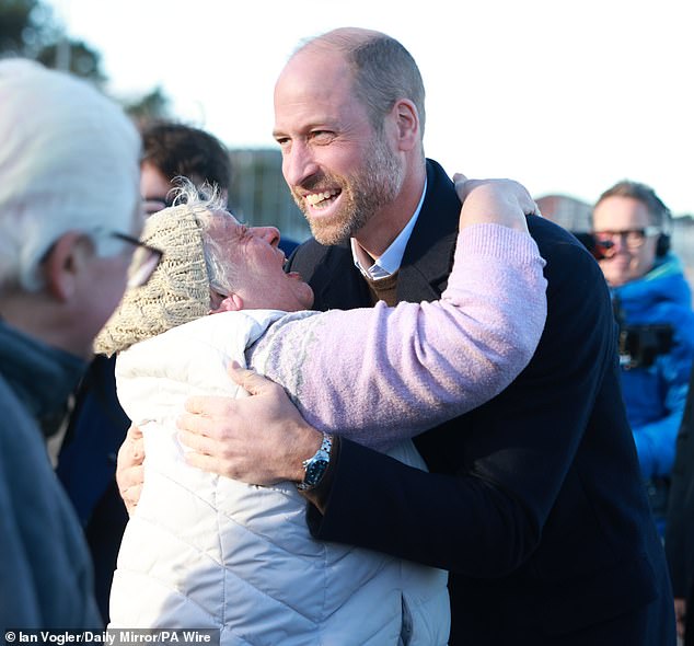 Today, William was hugged by Angela Jones from Conwy, a member of the public who had eagerly turned out to greet him
