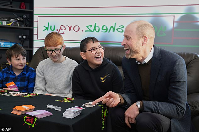 He was seen laughing as he enjoyed playing a variety of card games, including UNO