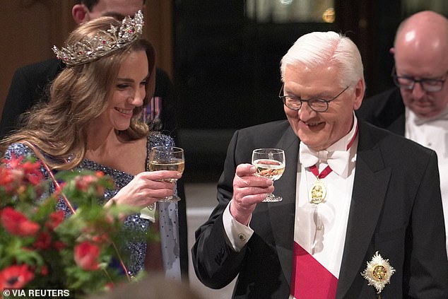 Princess Kate's touching tiara tribute as the King hosts the German President for a glittering state banquet… and someone was very pleased to be sitting next to a supermodel | Daily Mail