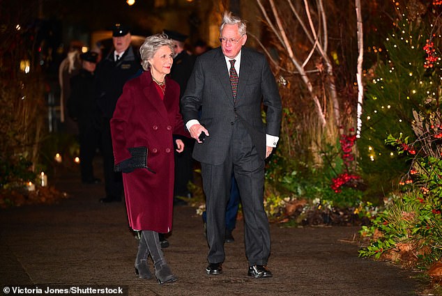 Birgitte, the Duchess, opted for a burgundy coat worn over a scarlet outfit for the occasion on Friday