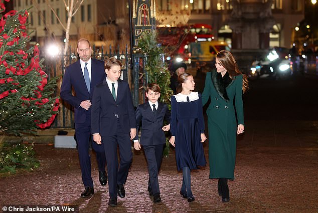 The whole family was sleek in navy and green, as the boys wore smart suits while Charlotte was adorable in a blue dress with a white collar - a perfect complement to her mother's emerald winter coat
