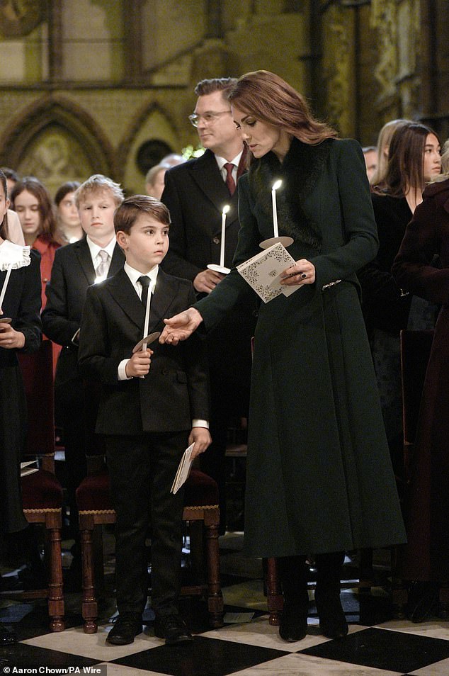 The Princess of Wales stands besides her youngest child, Prince Louis, seven, during the service at Westminster Abbey