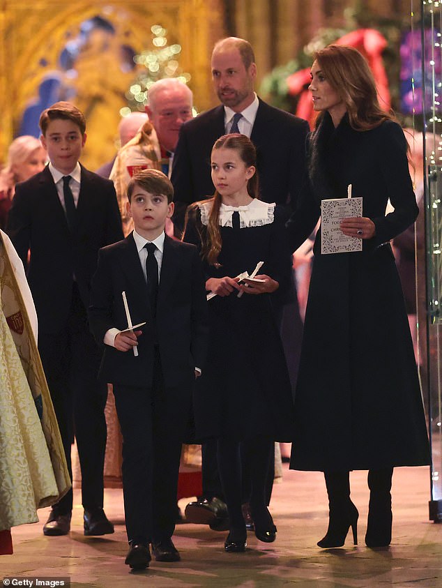 George, Charlotte and Louis stayed close to their parents for tonight's Christmas carol concert at Westminster Abbey