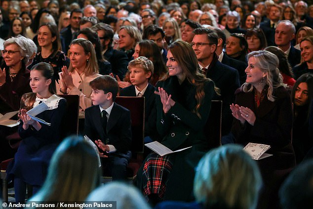 The family applauded as they took in the festive atmosphere at Westminster Abbey on Friday night