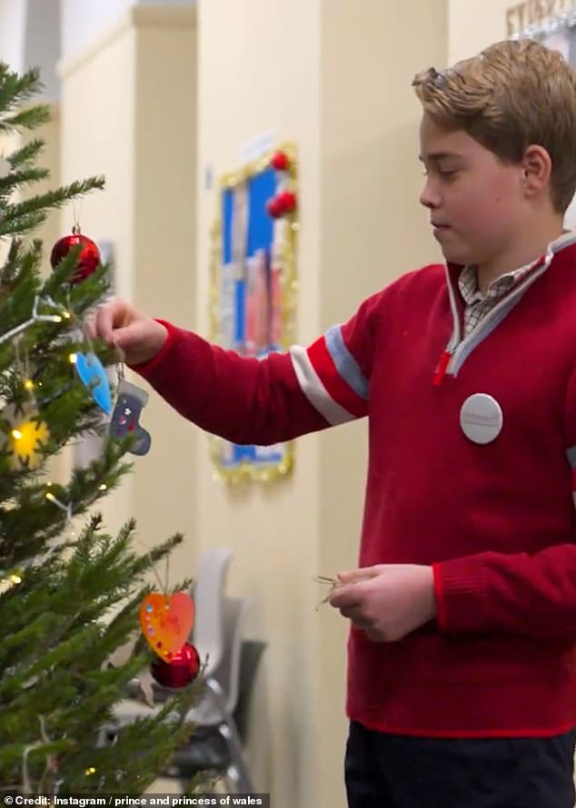 The young prince helped to decorate a tree which had been donated to the charity from Westminster Abbey following his mother's carol service