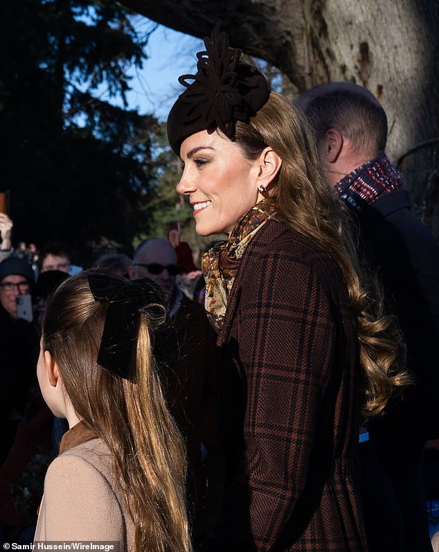 Catherine smiled at well-wishers as she accompanied senior royals for their annual Christmas church service