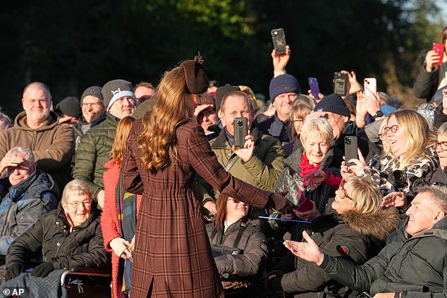 Catherine was seen spreading festive cheer as she met fans and posed for pictures after leaving St Mary Magdalene Church