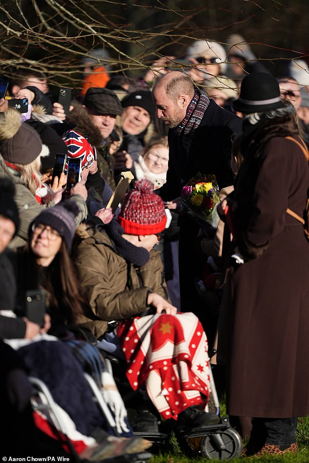 Prince William, 43, with members of the public