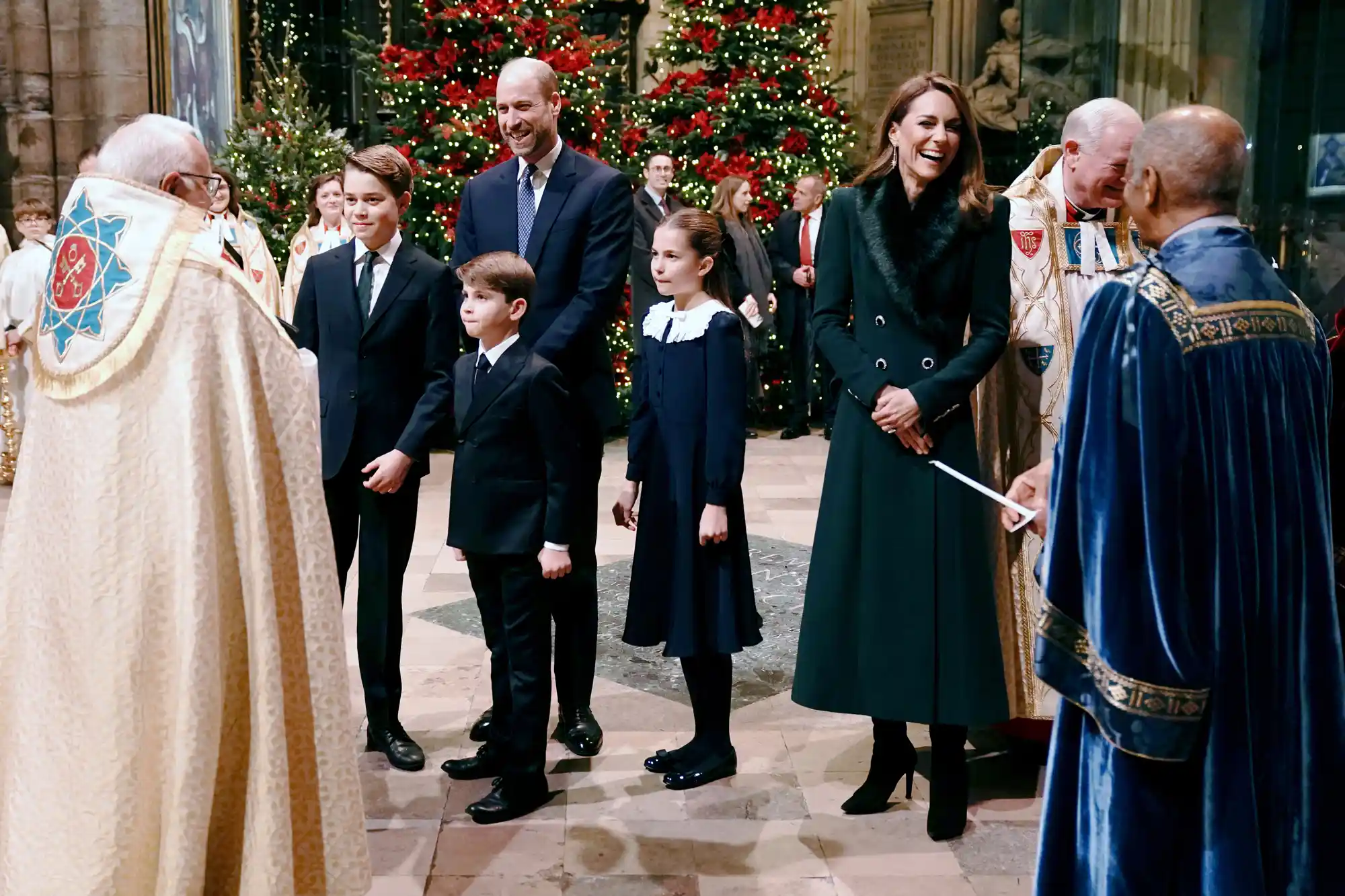 Britain's Prince William, Prince of Wales, Britain's Prince George of Wales, Britain's Prince Louis of Wales, Britain's Princess Charlotte of Wales and Britain's Catherine, Princess of Wales arrive to attend the fifth annual "Together At Christmas" Carol Service" at Westminster Abbey in London on December 5, 2025.