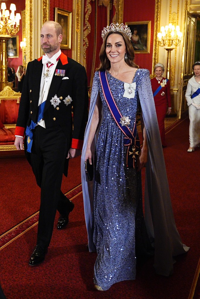William, Prince of Wales, and Catherine, Princess of Wales, arrive at a state banquet at Windsor Castle.