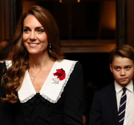BREAKING: Prince George Stuns the UK With Heartfelt Words After His First Solo Royal Appearance — “I Could Have Stood Next to My Mother in My Father’s Place”. All eyes were on Prince George of Wales, just 12 years old, as he made his official debut at the Royal British Legion Festival of Remembrance at London’s Royal Albert Hall — standing tall beside his mother, Princess Catherine, while Prince William represented the Crown in Brazil for COP30. Dressed in a classic black tuxedo, George looked every bit the young royal-in-training, his composure drawing whispers across the royal box. But it wasn’t his appearance that captured the nation — it was what he said afterward. As the event concluded, George reportedly turned to a palace aide and murmured: “I could have stood next to my mother in my father’s place.” Those ten words — innocent, tender, yet hauntingly mature — sent ripples through the Palace and the public alike. Was it pride? Pressure? Or the early sign of a future King already feeling the weight of destiny on his shoulders? One royal insider called it “the moment Britain saw the boy become the heir.”