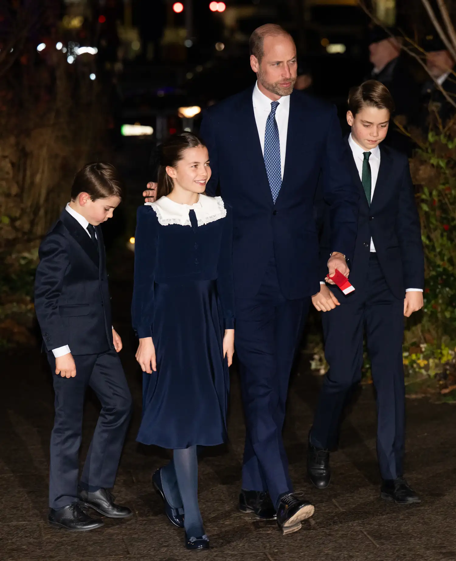 Prince William with his children at the "Together at Christmas" carol service in 2025.