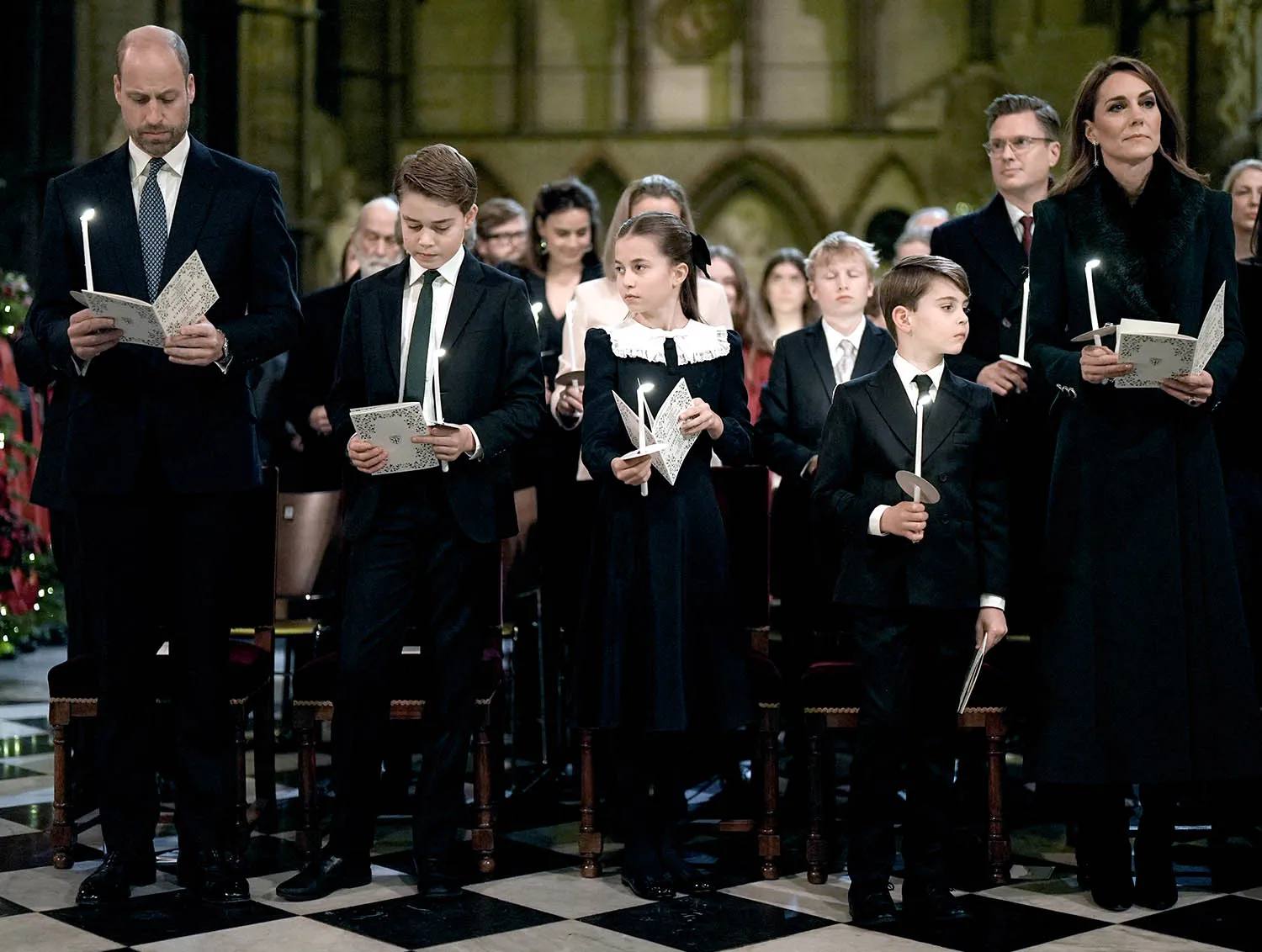 Britain's Prince William, Prince of Wales, Britain's Prince George of Wales, Britain's Princess Charlotte of Wales, Britain's Prince Louis of Wales and Britain's Catherine, Princess of Wales attend the fifth annual "Together At Christmas" Carol Service" at Westminster Abbey in London on December 5, 2025.