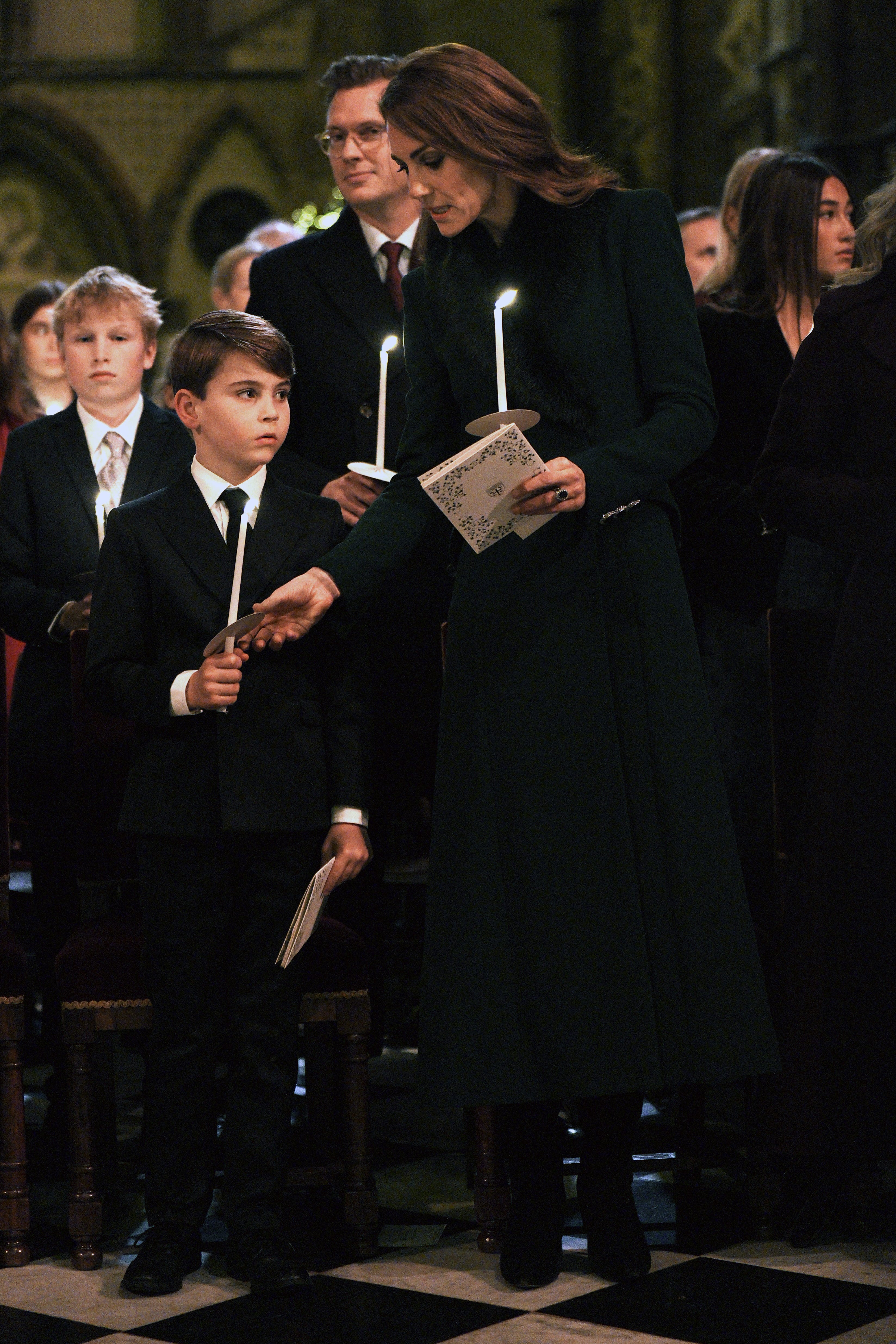 london, england december 5: catherine, princess of wales and prince louis during the together at christmas carol service at westminster abbey on december 5, 2025 in london, england. led by the princess and supported by the royal foundation, the annual event offered a chance to pause and reflect on the values of love, compassion, and the connections we share. the service also highlighted remarkable individuals from across the uk who have demonstrated extraordinary kindness, empathy, and support within their communities. (photo by aaron chown pool/getty images)