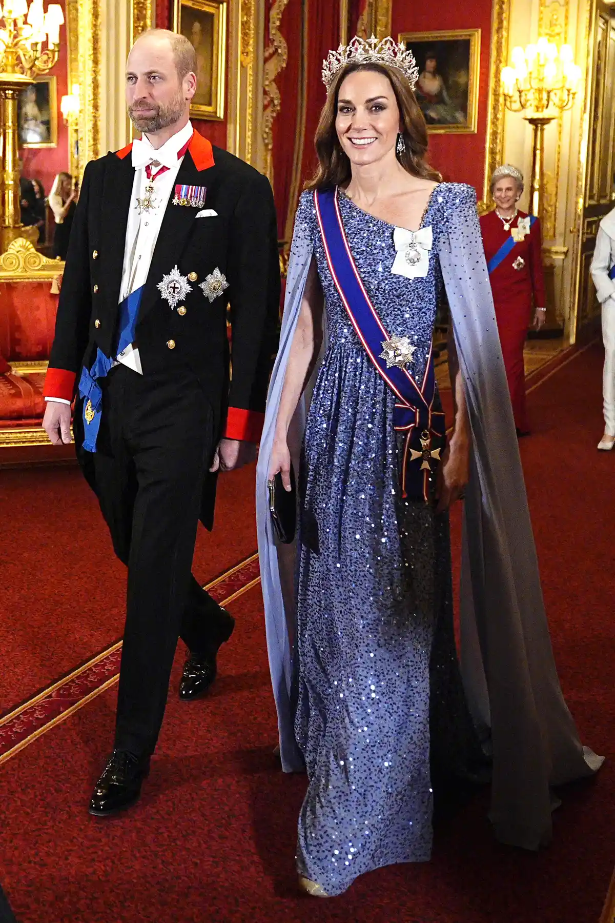 Britain's Prince William, Prince of Wales and Britain's Catherine, Princess of Wales arrive to attend a State Banquet at Windsor Castle in Windsor, on December 3, 2025, the first day of a three day state visit by the German President. President Frank-Walter Steinmeier received a ceremonial welcome to Britain Wednesday as his state visit got into full swing -- the first by Germany's official head of state in 27 years.