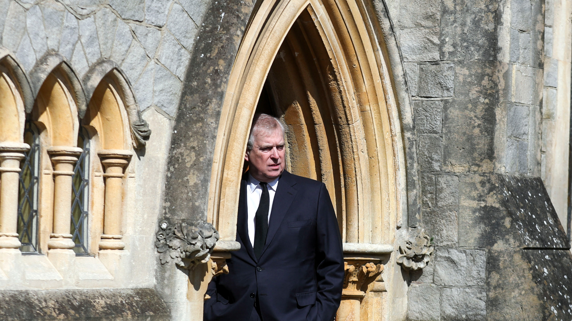 Prince Andrew standing in the doorway of the chapel at Royal Lodge