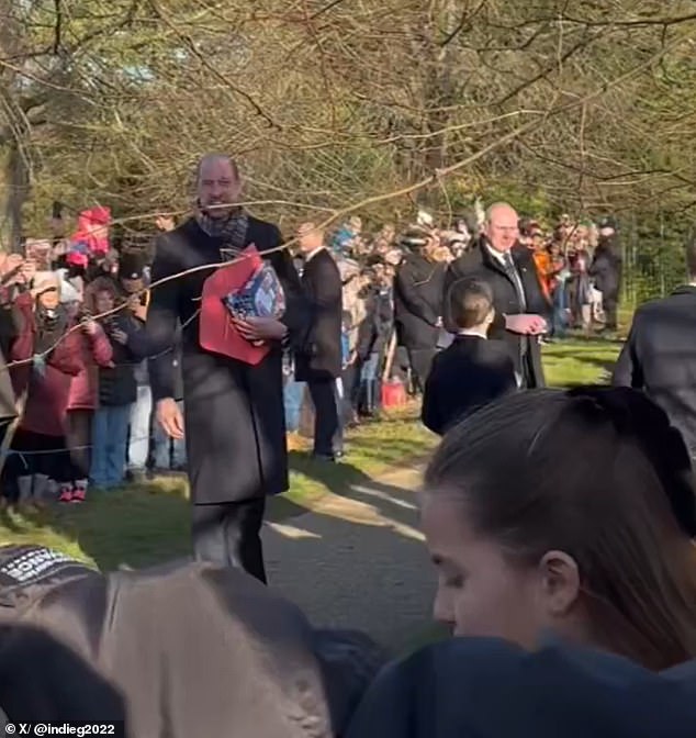 Prince William proudly beamed as his daughter greeted the crowds at Sandringham on Christmas Day