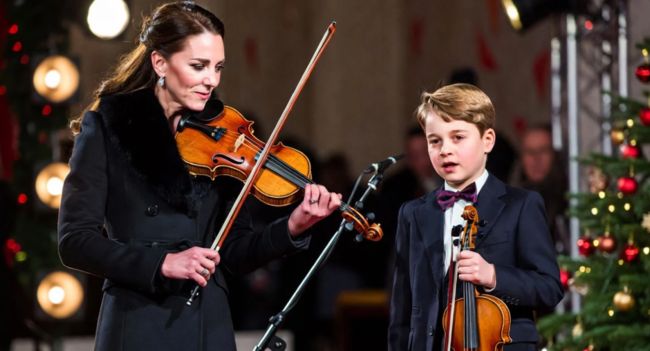 A Royal Moment No One Expected: Princess Catherine and Prince George’s emotional performance brought the entire hall to silence — and left even the King visibly moved. Standing side by side, mother and son sang not for applause, but for remembrance. And in that quiet moment, the future of the monarchy felt closer than ever. This wasn’t just a Christmas ceremony. It was history, gratitude, and legacy — passed from one generation to the next.