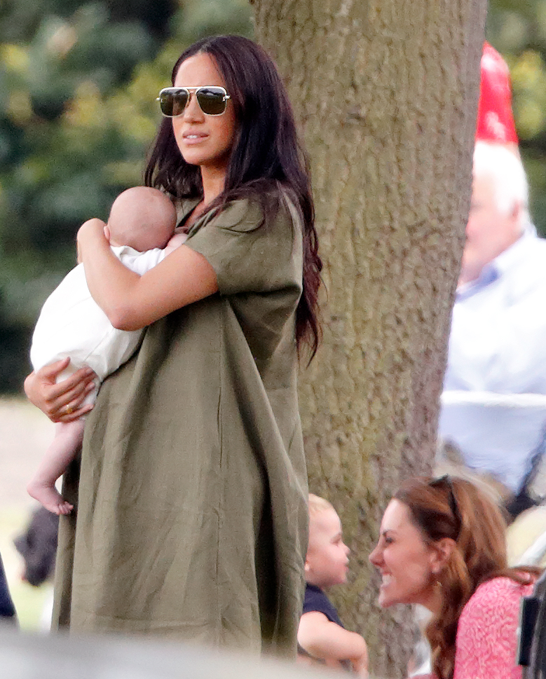 Meghan, Duchess of Sussex, holding Archie Harrison, at the King Power Royal Charity Polo Match.