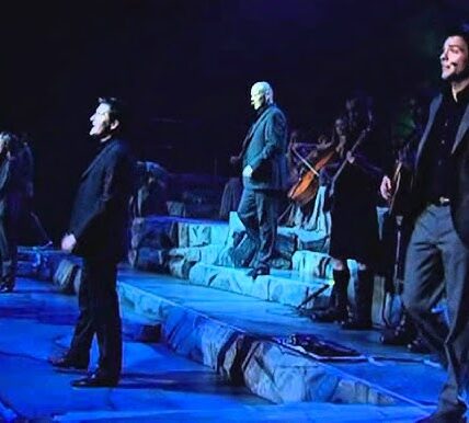 “STAY WITH ME ON THIS,” RYAN KELLY MURMURED — AND FROM BEHIND HIM, THE MEN OF CELTIC THUNDER ANSWERED, “WE’VE GOT YOU.” The exchange felt casual, almost like a quiet chat, but the moment Ryan Kelly stepped forward to sing “Brothers in Arms,” the room fell into a hush. Written during the Falklands War and made famous by Dire Straits in 1985, the song still carries the weight of loss, loyalty, and sacrifice. In this stripped-back, intimate performance, those emotions cut straight through. Kelly’s voice trembled with quiet resolve as the rest of Celtic Thunder wrapped him in harmony, like a final embrace — turning a war anthem into a deeply human farewell. It wasn’t flashy. It wasn’t loud. It was devastating — and impossible to look away