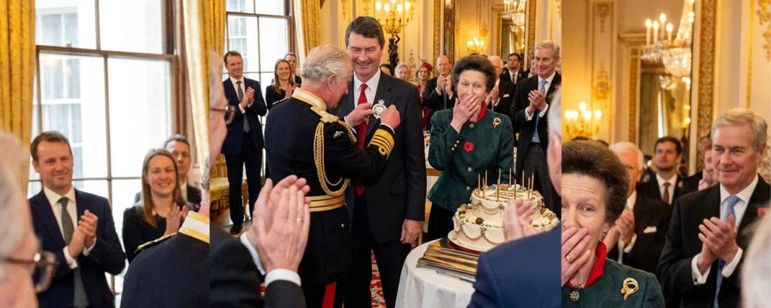 King Charles presented Timothy Laurence with a badge.