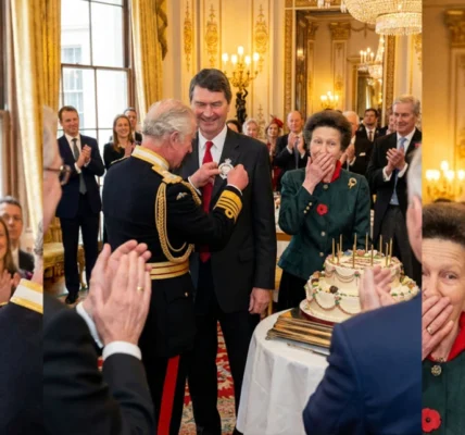 King Charles presented Timothy Laurence with a badge.