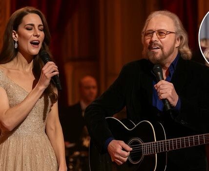 “When Princess Kate Stole the Spotlight: A Magical Duet With Barry Gibb That Melted Buckingham Palace”. “I Never Expected to Sing Tonight…” Whispered Princess Kate, and What Followed Was Nothing Short of Enchanting. In the Glittering Grandeur of Buckingham Palace, Amid Chandeliers and Champagne Flutes, the Unthinkable Happened: Barry Gibb Invited the Duchess to Join Him on Stage for an Impromptu Performance of How Deep Is Your Love.