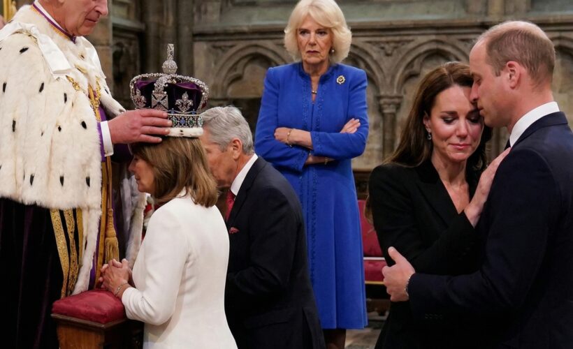 An incredibly awkward moment when Carole and Michael Middleton knelt to receive an unexpected badge from King Charles III.