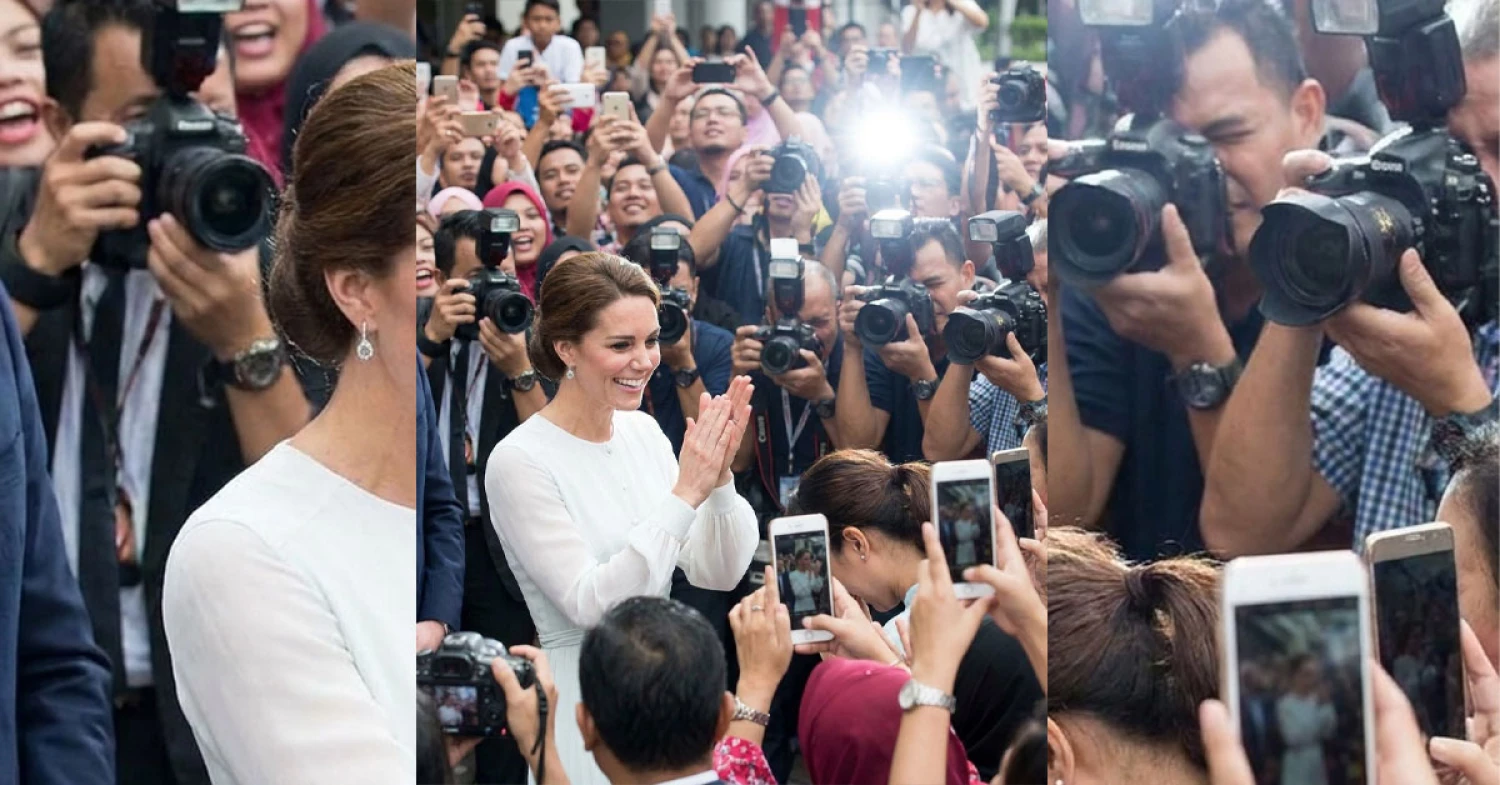 Amidst resounding applause and hundreds of watchful eyes Amidst resounding applause and hundreds of watchful eyes