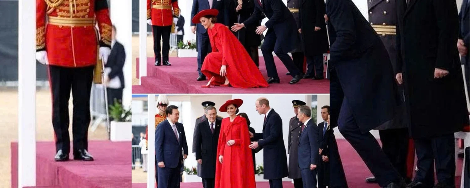 As Catherine was walking onto the stage in her striking bright red outfit As Catherine was walking onto the stage in her striking bright red outfit