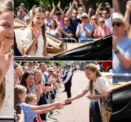 Princess Charlotte melts hearts—graceful white carriage smile